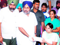 After The Tribune highlighted her plight, this wheelchair-ridden kabaddi player received a cheque of Rs 1 lakh from the Deputy CM on Wednesday