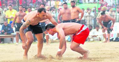 Players of Germany and India in action in the Kabaddi World Cup in Faridkot on Wednesday. India beat Germany 70-18