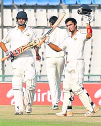 Punjab�s Mandeep Singh raises his bat after completing his century against Uttar Pradesh during their Ranji Trophy match at PCA stadium, Mohali, on Thursday