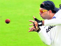 Yuvraj Singh catches the ball during a practice session in New Delhi on Saturday. Match Starts at 9:30 am