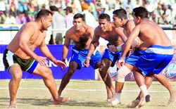 A Pakistan player (L) in action against Sri Lanka in Roopnagar on Saturday. Pakistan beat Sri Lanka 71-8