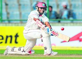 Shivnarine Chanderpaul of West Indies plays a shot during the first day of the first Test against India in New Delhi on Sunday