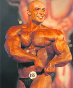 A Bodybuilder poses on stage during the 65th IFBB Men's World Amateur Bodybuilding Championships in Mumbai on Sunday. 