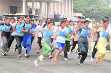Girl candidates run during the recruitment drive for woman constables by Punjab police at the Polo Ground in Patiala on Wednesday. 