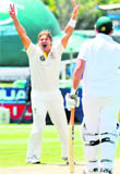 Shane Watson gets rid of Jacques Kallis for a duck in the first Test at Newlands in Cape Town 