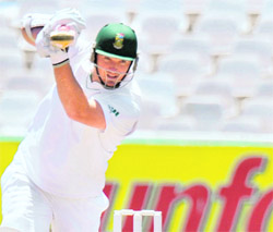 South African captain Graeme Smith scores his 100th run during the first Test against Australia in Cape Town on Friday