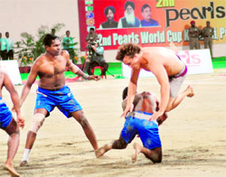 Players of Sri Lanka (blue) and Argentina in action in Amritsar on Friday