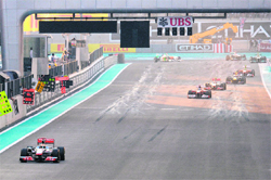 McLaren Mercedes' driver Lewis Hamilton leads after the start of the Abu Dhabi Grand Prix at the Yas Marina circuit in Abu Dhabi on Sunday. 