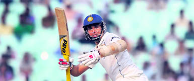 VVS Laxman plays a shot during the first day of the second Test against West Indies at The Eden Gardens in Kolkata on Monday.