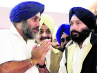 Deputy CM Sukhbir Badal with Akali leader Barjinder Singh Brar and former DGP PS Gill (centre) in Moga