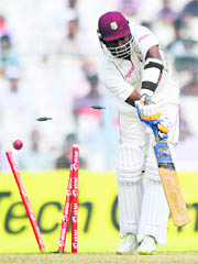 West Indies� Darren Bravo is clean bowled during the third day of the second Test against India at The Eden Gardens in Kolkata on Wednesday. 