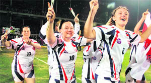 The English women�s team celebrate after beating Turkmensitan during the Kabaddi World Cup in Jalandhar on Wednesday. 