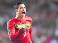 Portugal's Cristiano Ronaldo celebrates after scoring a goal against Bosnia Hergovina during their Euro 2012 play-off second leg match at Luz Stadium in Lisbon on Tuesday. Portugal won 6-2. 