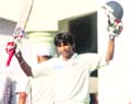 Sagar Jogiyani celebrates after completing his century against Punjab during their Ranji Trophy match at the PCA Stadium, Mohali 