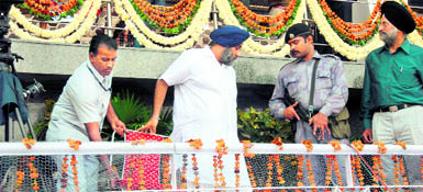Deputy Chief Minister Sukhbir Singh Badal gets chairs shifted in Ludhiana on Sunday.