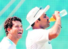 Sachin Tendulkar watches Virender Sehwag during a team practice session at the Wankhede Stadium in Mumbai on Sunday. India are looking to keep the pressure on the beleaguered West Indies team in the third and final Test of the series starting in Mumbai from Tuesday