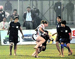 Women kabaddi players of India and England in action in the final in Ludhiana on Sunday