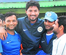 Saurashtra�s Siddharth Trivedi (C) being lifted by teammates in Mohali on Sunday