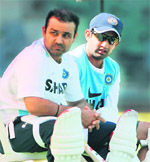 Virender Sehwag (L) and Gautam Gambhir attend a practice session at the Wankhede Stadium in Mumbai 