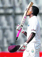 West Indies batsman Darren Bravo celebrates his century in the third Test against India in Mumbai on Wednesday.