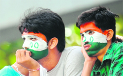 Indian cricket fans are dejected as Sachin Tendulkar falls after scoring 94 runs in Mumbai on Friday. 