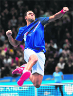 Jo-Wilfried Tsonga of France jumps in celebration after beating Rafael Nadal of Spain in the ATP World Tour Finals in London on Thursday.