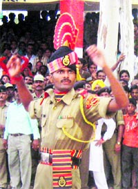 A BSF jawan during the retreat ceremony at JCP Sadiqi in the Fazilka sector