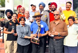 Winners of Rotary District Golf tournament pose with their trophies at the Chandigarh Golf Club on Sunday