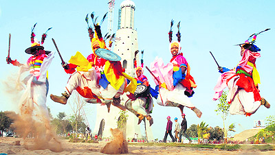 Artistes rehearse for the opening ceremony at Chappar Chiri. Tribune photo: Vicky Gharu
