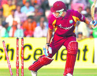 West Indies� Marlon Samuels is bowled by Varun Aaron during the first one-day international in Cuttack