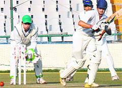 Punjab�s Uday Kaul plays a shot against Railways in Mohali 