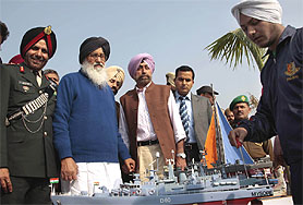 CM Parkash Singh Badal being shown a model of a warship during the inauguration of a naval unit of the NCC, in Bathinda on Friday. Major-General MS Virk, additional director general of NCC, is also seen in the picture. A Tribune photograph