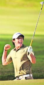 Rory McIlroy celebrates after winning the UBS Hong Kong Open on Sunday
