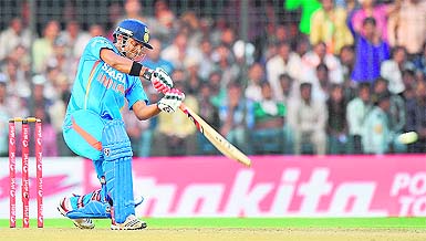 Suresh Raina plays a shot during the fourth ODI against West Indies in Indore on Thursday. Virender Sehwag scored the highest individual score in ODIs as India scored a massive 418