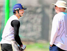 Suresh Raina with coach Duncan Fletcher during a practice session ahead of the 5th ODI against West Indies in Chennai on Saturday