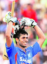 Manoj Tiwary celebrates his first-ever international century during the fifth ODI against West Indies in Chennai on Sunday.