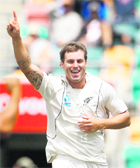 New Zealand's Doug Bracewell celebrates a wicket in Hobart on Monday. 