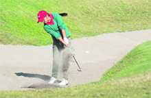 A golfer plays a bunker shot at the Chandigarh Golf Club on Wednesday. 