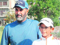 Aadil Bedi (right) with coach Jessie Grewal at the CGA Range in Chandigarh. 