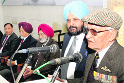 Air Marshal Randhir Singh (retd) with Congress Ex-servicemen Cell convener Capt GS Jawandha (retd) at a function in Chandigarh on Friday. 