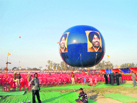 Akali Dal workers and policemen at the party�s rally venue in Killi Chahal village of Moga on Saturday. 