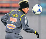 Neymar of Santos FC and Lionel Messi (right) of Barcelona warm up at a training session in Yokohama on Saturday. Santos take on Barcelona in the final of the Club World Cup on Sunday pitting Messi against Neymar in what is being billed as a clash between two of the finest players on the planet