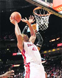 Dexter Pittman #45 of the Miami Heat shoots during a preseason game against the Orlando Magic in Miami on Sunday. Miami won 118-85