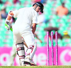 Rahul Dravid is bowled for 29 runs by Ben Hilfenhaus in Sydney on Thursday. 