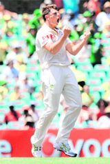 James Pattinson celebrates the wicket of Virat Kohli on the fourth day in Sydney on Friday. 