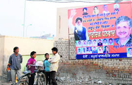 A SAD poster on the wall of a public building in Dhobina Basti, Bhatinda, in violation of the poll code of conduct. 