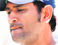 Crestfallen: MS Dhoni looks on after Australia won the third Test by an innings and 37 runs in Perth on Sunday