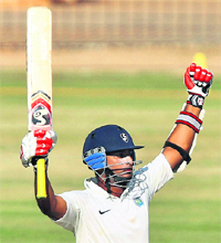 Rajasthan's Vineet Saxena celebrates his double century during the 2nd day of the Ranji Trophy final against Tamil Nadu in Chennai on Friday.