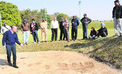 Grant Moir (L) speaks to budding referees at the CGA in Chandigarh