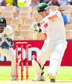 Michael Clarke plays a shot against India on the first day of the fourth Test in Adelaide on Tuesday. 